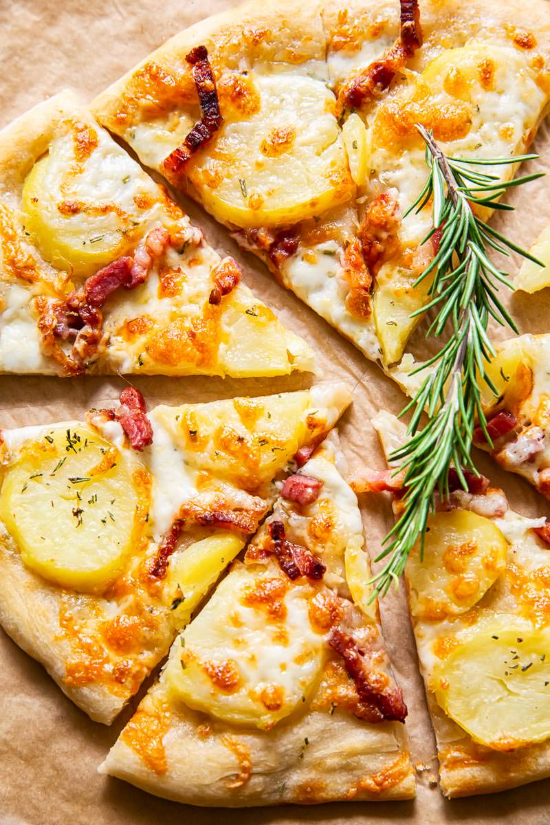 White pizza with thinly sliced potato and pancetta